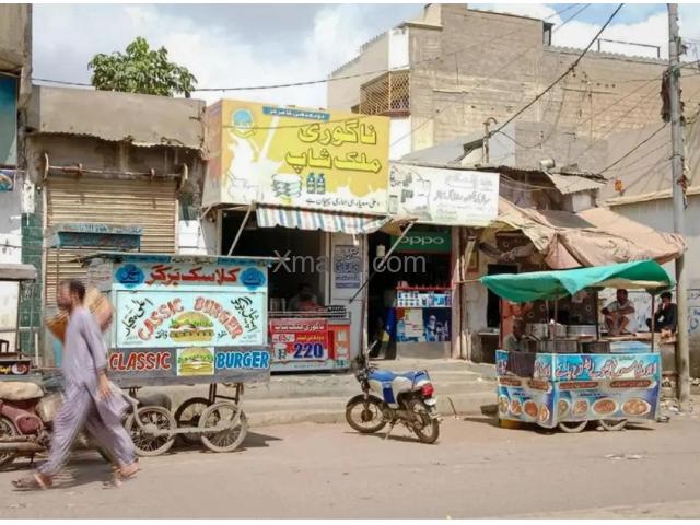Commercial Corner Plot in Baldia Town with 4 Shops